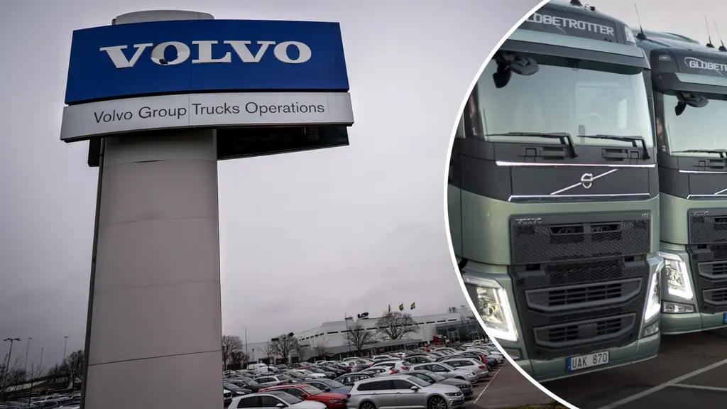 Till vänster en skylt där det står Volvo Lastvagnar. Till höger flera lastbilar. 