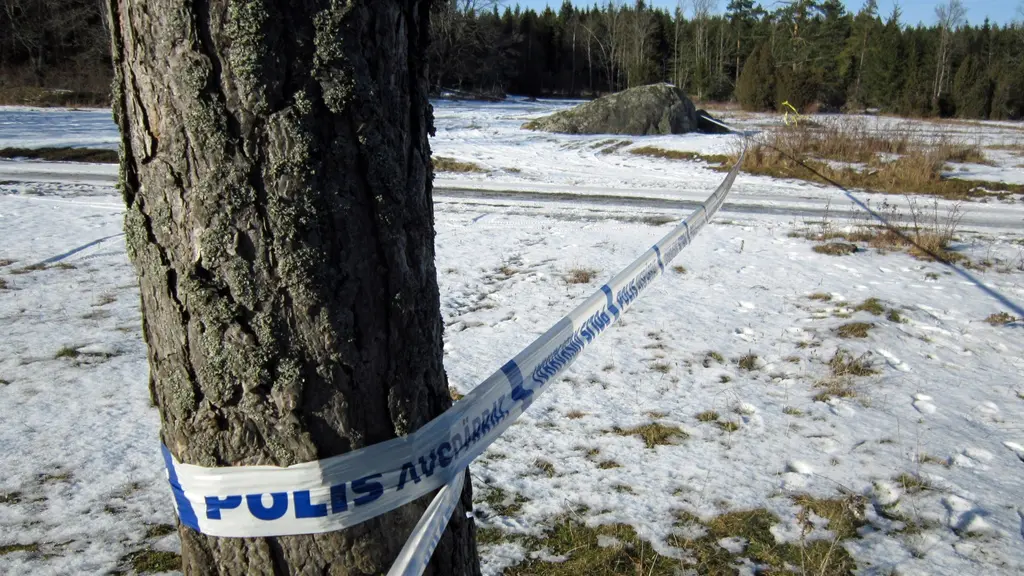 Avspärrning vid mordplatsen.