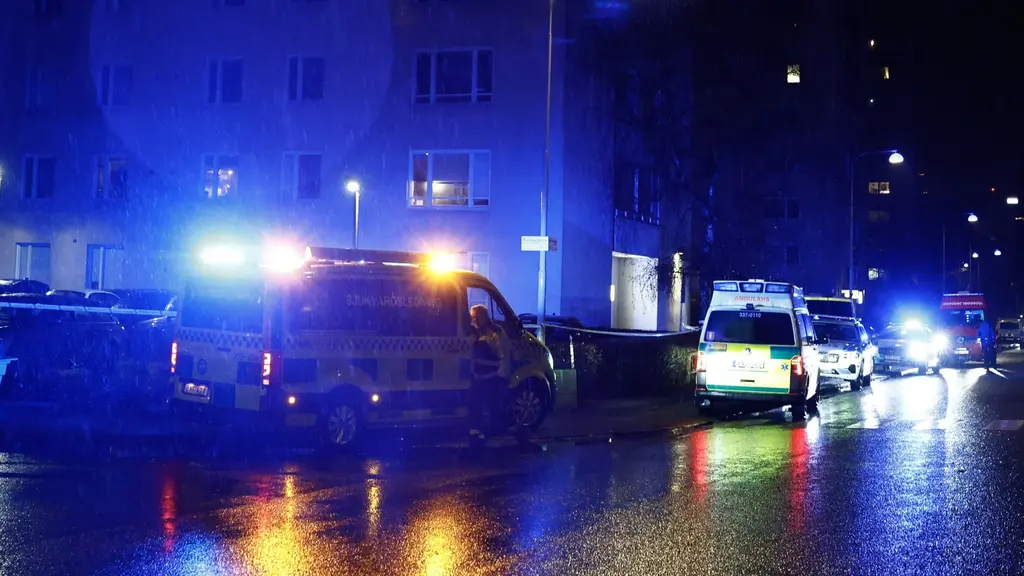 Police units outside a building