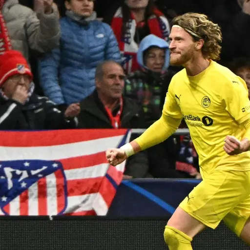 Bodoe/Glimt's Danish forward #09 Kasper Waarst Hogh celebrates scoring his team's second goal during the UEFA Champions League league phase day 8 football match between Club Atletico de Madrid and Bodoe/Glimt at Metropolitano Stadium in Madrid on January 28, 2026. (Photo by JAVIER SORIANO / AFP