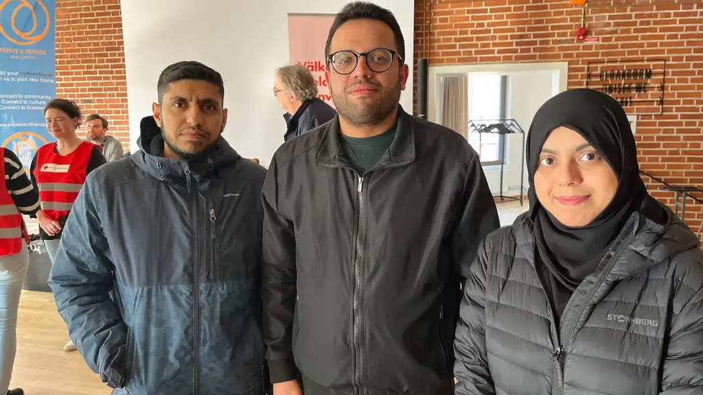 Two men and a woman