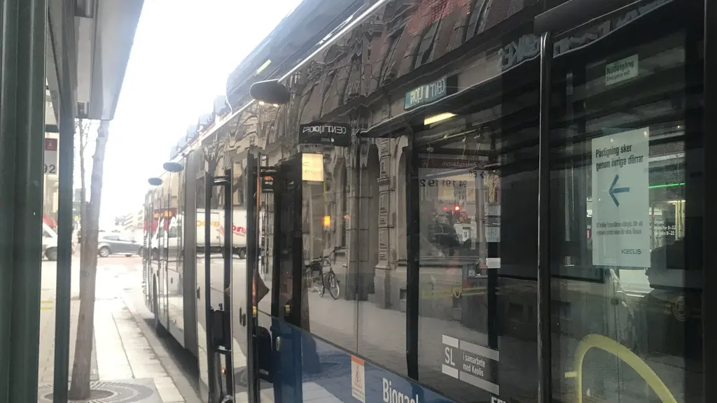 A bus with the back door open.