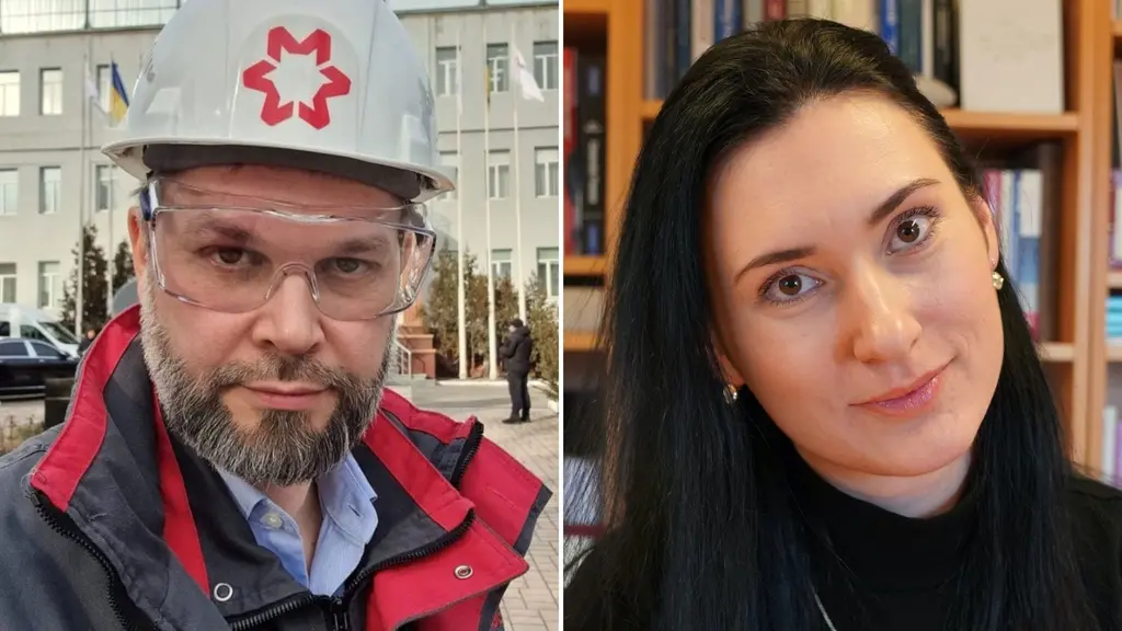 man med hjälm och skägg och kvinna framför bokhylla