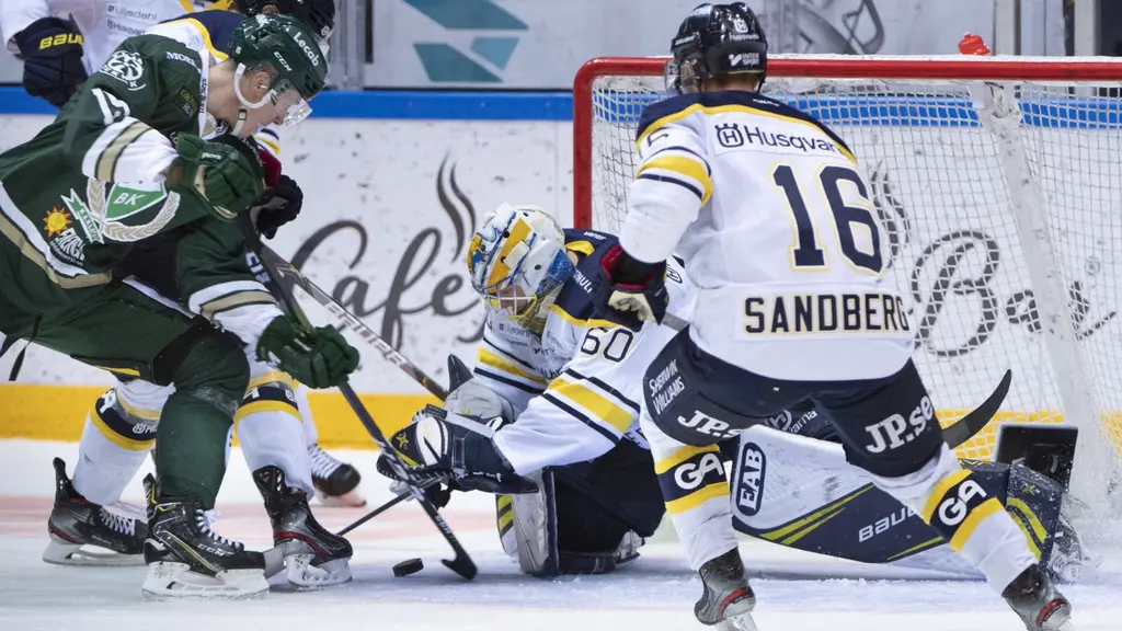 kamp framför ett hockeymål